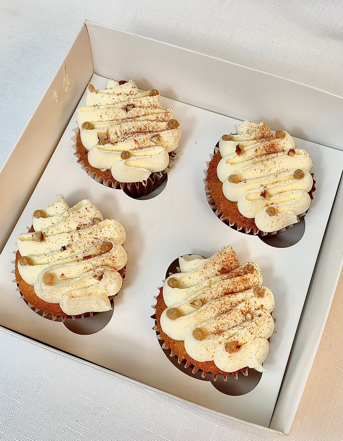 Brown butter maple cupcakes piped with silky maple buttercream